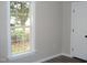 Cozy bedroom with large window allowing for natural light at 5780 Plain View Hwy, Dunn, NC 28334
