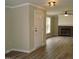 Inviting living room featuring hardwood floors, fireplace, and natural light at 5780 Plain View Hwy, Dunn, NC 28334
