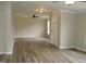 Spacious living room with hardwood floors and neutral paint at 5780 Plain View Hwy, Dunn, NC 28334