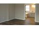 Open main bedroom leads to en-suite bathroom with soaking tub and vanity at 5780 Plain View Hwy, Dunn, NC 28334