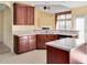 Spacious kitchen with wooden cabinets, countertops, and an island at 6101 Clarks Fork Dr, Raleigh, NC 27616