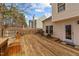 Backyard deck with railing features stairs to yard at 613 Holly Thorn Trce, Holly Springs, NC 27540