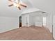 Comfortable bedroom featuring cozy carpeting and a well-lit interior at 613 Holly Thorn Trce, Holly Springs, NC 27540