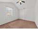 Bright bedroom with ample natural light and a ceiling fan at 613 Holly Thorn Trce, Holly Springs, NC 27540
