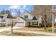 A charming two-story home with a well-kept lawn on a sunny day at 613 Holly Thorn Trce, Holly Springs, NC 27540