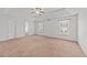 Large main bedroom with multiple windows for abundant natural light and space at 613 Holly Thorn Trce, Holly Springs, NC 27540