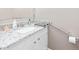 Bathroom vanity with granite countertop and a brushed nickel faucet at 627 W Front St # C, Burlington, NC 27215