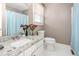 Bright bathroom features granite counters, white vanity, tile floors, and modern fixtures at 627 W Front St # C, Burlington, NC 27215