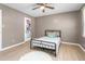 Bedroom with hardwood floor and a ceiling fan, and nice natural light at 627 W Front St # C, Burlington, NC 27215