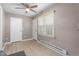 Bedroom with a large window, natural light, and luxury vinyl plank flooring at 627 W Front St # C, Burlington, NC 27215