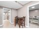 Additional dining space with wooden table and chairs and luxury vinyl plank flooring at 627 W Front St # C, Burlington, NC 27215