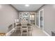 Dining area with a large table, seating for six, and natural light at 627 W Front St # C, Burlington, NC 27215