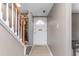 Inviting entryway features a staircase and a white front door with half-moon window detail at 627 W Front St # C, Burlington, NC 27215