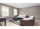 Comfortable living room with two sofas, natural light, and a stylish rug at 627 W Front St # C, Burlington, NC 27215