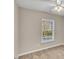 Bedroom featuring a window and neutral paint at 706 Canyon Lake Cir, Morrisville, NC 27560