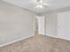 Neutral bedroom with ceiling fan, and carpet flooring at 706 Canyon Lake Cir, Morrisville, NC 27560