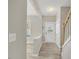Welcoming entryway with light flooring and staircase leading to upper level at 706 Canyon Lake Cir, Morrisville, NC 27560