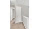Hallway with neutral carpet and gray paint and white trim at 706 Canyon Lake Cir, Morrisville, NC 27560