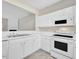Close-up of a kitchen with lots of bright counter space and modern appliances at 706 Canyon Lake Cir, Morrisville, NC 27560