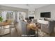 Open-concept living room with fireplace, plenty of seating and natural light at 706 Canyon Lake Cir, Morrisville, NC 27560