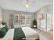 Serene main bedroom with vaulted ceiling, bright windows, and ensuite bathroom at 706 Canyon Lake Cir, Morrisville, NC 27560