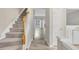 Carpeted staircase leading to the upper level of this stylish home at 706 Canyon Lake Cir, Morrisville, NC 27560
