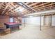 Finished basement featuring a pool table, fireplace, and exposed ceiling at 7414 Virgilina Rd, Roxboro, NC 27574
