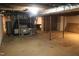 Spacious basement with exposed ceiling, mechanicals, and potential for customization at 7414 Virgilina Rd, Roxboro, NC 27574