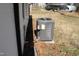 Exterior shot of an air conditioning unit on a white brick house at 7414 Virgilina Rd, Roxboro, NC 27574