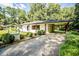 View of the house showing the well and the carport at 7414 Virgilina Rd, Roxboro, NC 27574