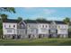 Charming townhouse with classic white facade, stone accents, and well-manicured lawn at 813 Washington St, Fuquay Varina, NC 27526