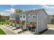 Exterior elevation of newly built townhomes with private balconies at 813 Washington St, Fuquay Varina, NC 27526