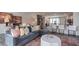 Spacious living room featuring a comfortable sofa and views of the kitchen at 823 Washington St, Fuquay Varina, NC 27526