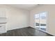 Bright dining area with a sliding glass door to the backyard at 94 Paper Birch Way, Fuquay Varina, NC 27526