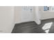 Bright entryway features sleek, dark wood-look flooring at 94 Paper Birch Way, Fuquay Varina, NC 27526