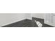 The room features dark wood-look floors and bright white doors and trim at 94 Paper Birch Way, Fuquay Varina, NC 27526