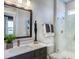 Modern bathroom featuring a glass-enclosed shower, contemporary vanity, and stylish fixtures with bright natural light at 0 High Rock Rd, Efland, NC 27243