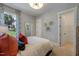 Bright and airy bedroom with large windows, a comfortable bed, and stylish wall decor at 0 High Rock Rd, Efland, NC 27243