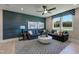 Stylish living room featuring a dark-colored accent wall, comfortable seating, and patterned rug, perfect for relaxing at 0 High Rock Rd, Efland, NC 27243