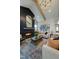 Inviting living room featuring a fireplace, wood beams, and comfortable seating with stylish decor and a view of entry at 0 High Rock Rd, Efland, NC 27243