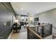 Open-concept living area with modern furnishings, a ceiling fan, and ample natural light at 0 High Rock Rd, Efland, NC 27243