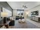 Comfortable living room featuring a large sectional sofa, modern decor, and large windows for plenty of natural light at 0 High Rock Rd, Efland, NC 27243