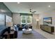 Comfortable living room with a gray sectional, patterned rug, and modern decor at 0 High Rock Rd, Efland, NC 27243