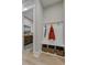 Functional mudroom with built-in bench, storage baskets, and hooks for organizing coats and accessories at 0 High Rock Rd, Efland, NC 27243