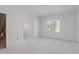Large attic space with window and view of the neighborhood, ideal for custom build-out at 104 Pointe Park Cir, Holly Springs, NC 27540