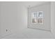 Bright bedroom with ample natural light streaming through the large windows at 104 Pointe Park Cir, Holly Springs, NC 27540