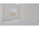 Bright bedroom with ample natural light streaming through the large windows at 104 Pointe Park Cir, Holly Springs, NC 27540