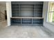 Living room featuring a built-in shelving unit providing ample space at 104 Pointe Park Cir, Holly Springs, NC 27540