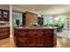 Open concept kitchen and dining area with custom island at 107 Marseille Pl, Cary, NC 27511