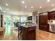 Kitchen with island, stainless steel appliances, and breakfast nook at 107 Marseille Pl, Cary, NC 27511